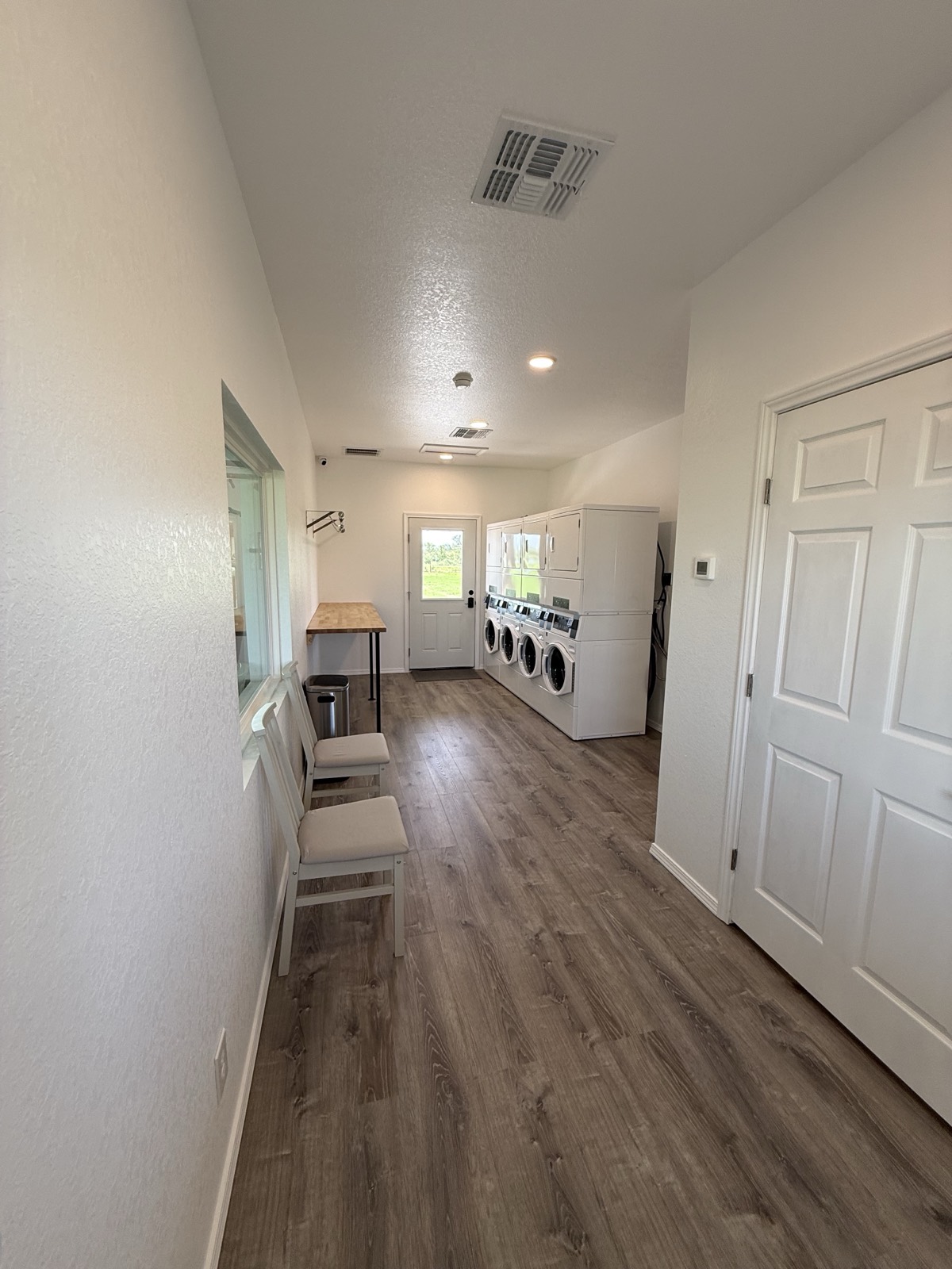 On-site laundromat with washers and dryers at Shade Stop RV of Floresville
